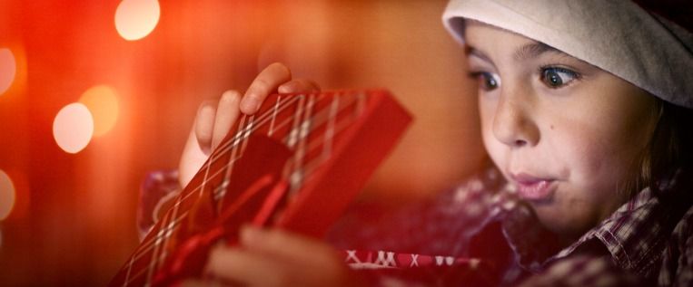 little-girl-with-gift-picture-id499596648